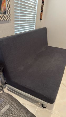 Futon (couch/bed) With Two Covers (Sleeper Sofa)