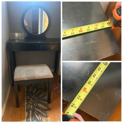 Black vanity with stool