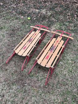 wooden snow sleds
