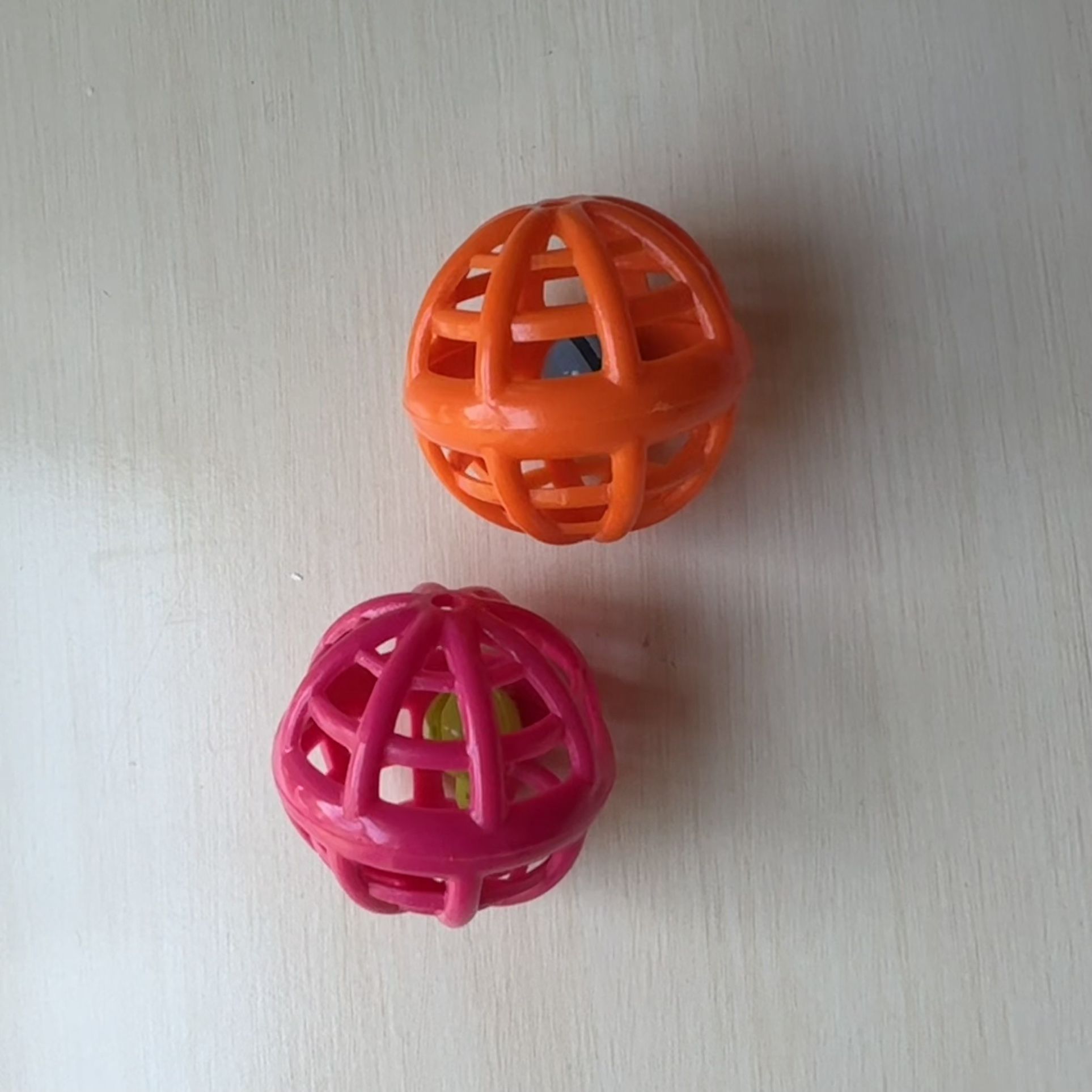 Two Pink and Orange Jingle Bell Ball Cat Toys