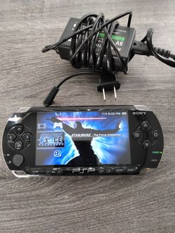 PSP 1000 with charger and game