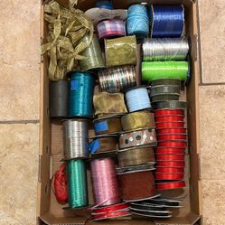 45 Rolls of Ribbon Plus Gold Bows