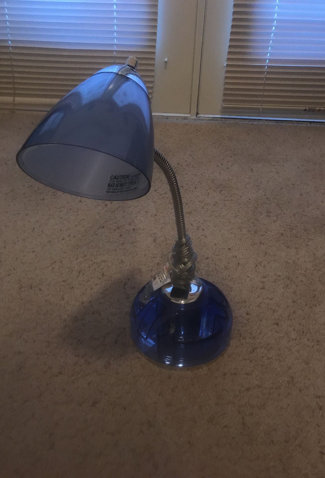Lamp with storage and outlet