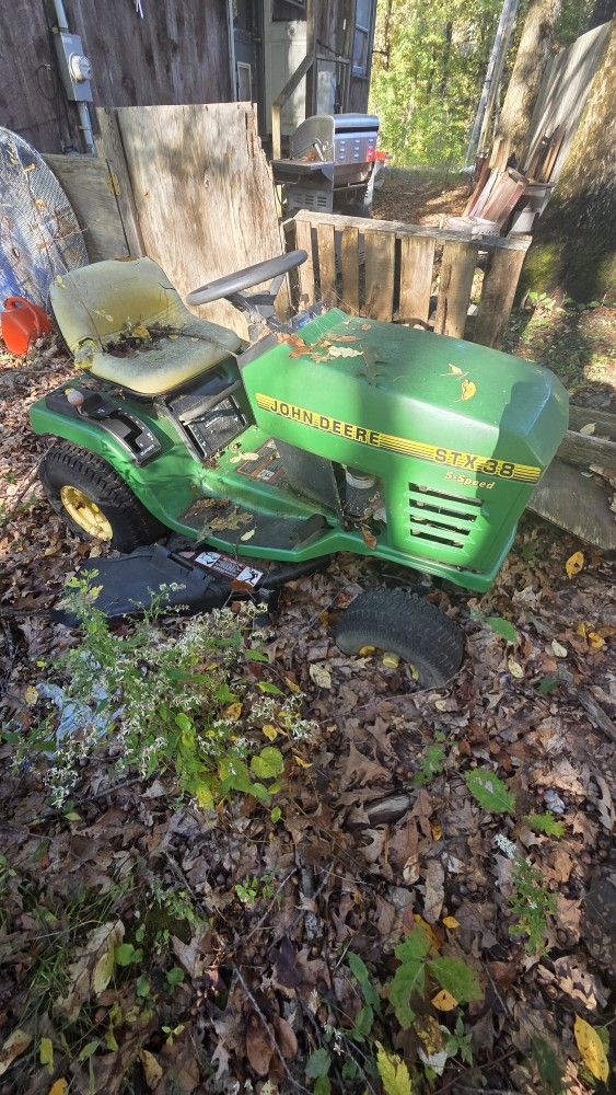 John Deere STX38 Ride-On Mower – Rough / Needs Work (No Key) – You Grab or I Deliver (Fee) (AS-IS/for parts or repair)