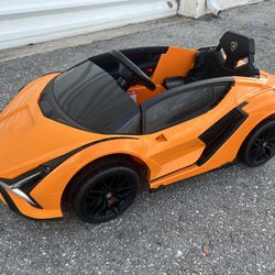*Not Working* 12V Orange Lamborghini Electric Kid’s Car, tested with new battery and wouldn’t turn on. Does not include battery or charger.