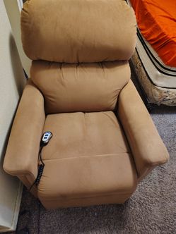 Massage chair with built in heater