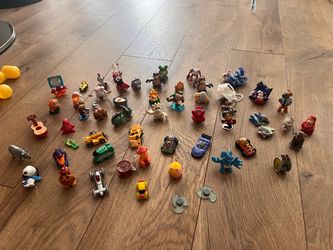 56 Kinder Surprise Toys in Egg Case