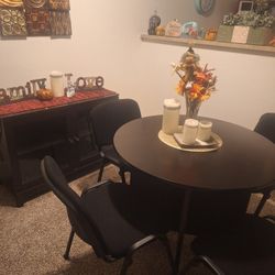 Table and four chairs