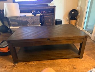 Coffee table storage when opened up .