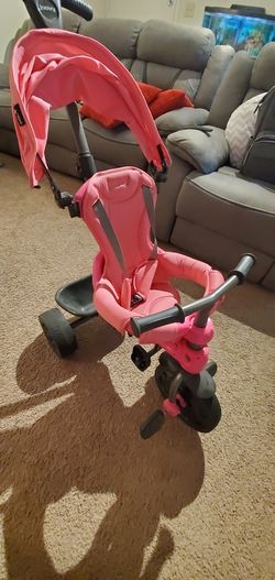 Triciclo de niña rosado interesado llamar al {contact info removed}