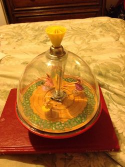 Vintage musical ballerina spin top