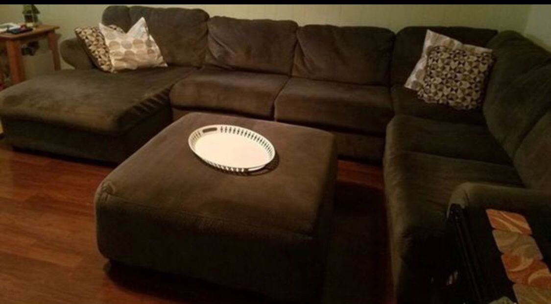 Ashley sofa sectional- light brown- no pets - no smokes - 1 years and half . Clean and good condition. Ottoman in photo is included