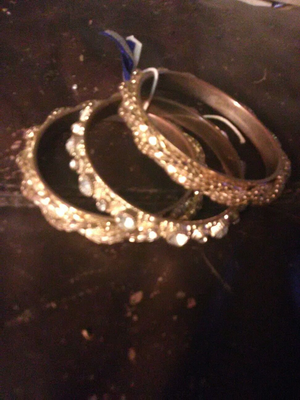 Gold tone bangles