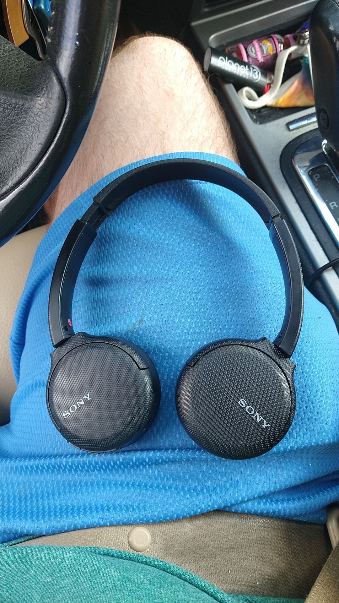 Sony wireless headphones and Quikcell ear buds