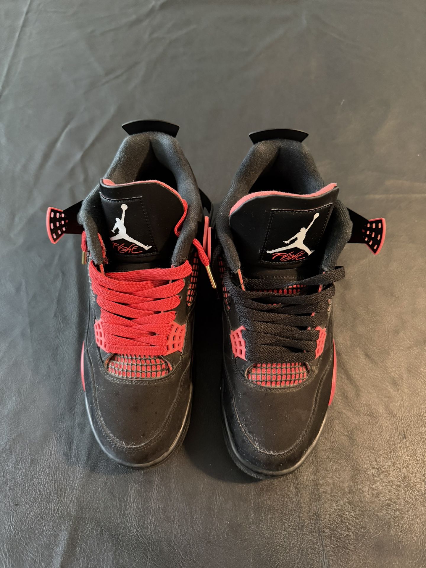 Red Thunder Jordan 4s