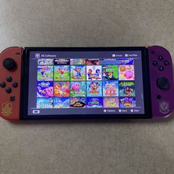 NINTENDO SWITCH OLED + 125 SWITCH GAMES and 7500 RETRO CLASSIC GAMES