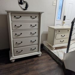 White dresser and nightstand..