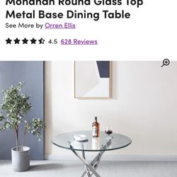Glass metal base dining table
