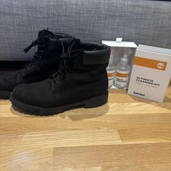 Black Timberland boots with cleaning kit 10.5M