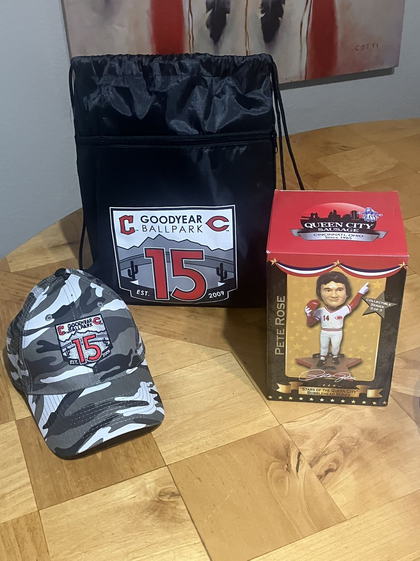 Pete Rose/Goodyear Ballpark 15 Year Collector’s Package Includes Pete Rose Bobblehead Camo Hat and Log Bag