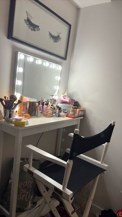 Vanity mirror with table and chair