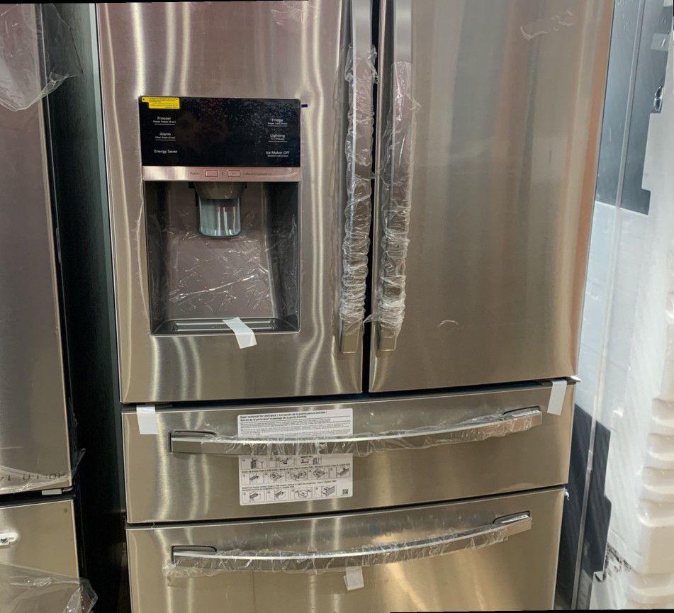 Samsung 33 in. W 24.73 cu. ft. 4-Door French Door Refrigerator in Stainless Steel WU GV
