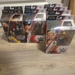 Lot of 8 WWE Elite Action Figures Cody Rhodes, Trish Stratus, Kevin Owens