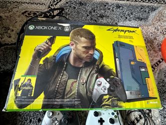 Xbox one X cyberpunk 2077 console with controller and games