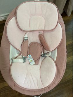 Pink baby swing