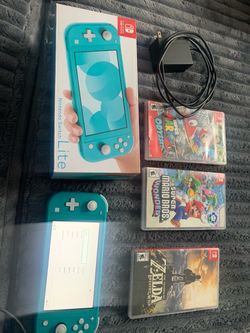 Nintendo Switch Lite w/ 3 games