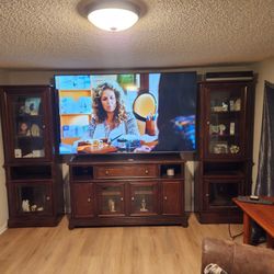 86 INCH LG TV AND ENTERTAINMENT CENTER 