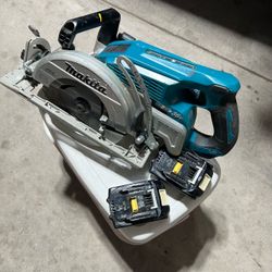 Makita skill saw and 2 batteries.