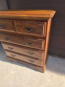 Wood Dresser  with wheels good condition
