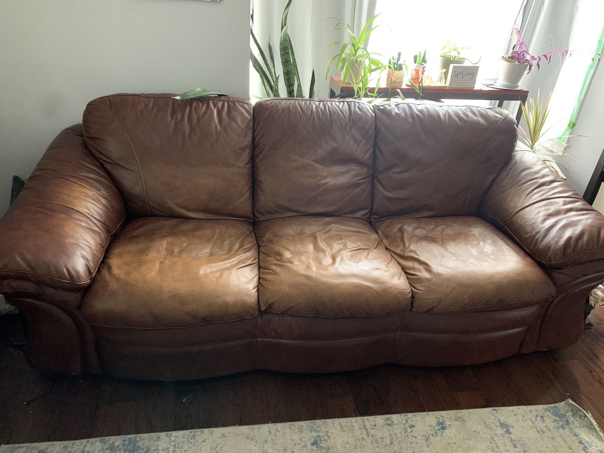 Leather Couch And Chair. Glass Coffee Table