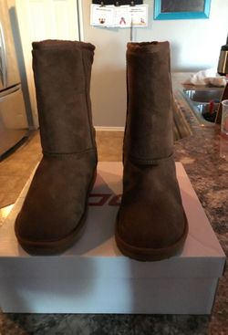 Girls warm boots from Tilly’s size 4