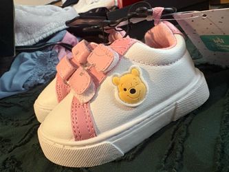 Brand new Winnie the Pooh babygirl shoes size 4