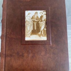 So Unique! Brown, leather LARGE bound 50 page scrapbook. Each page has a paper protective covering for items for the book. Never used Great condition.