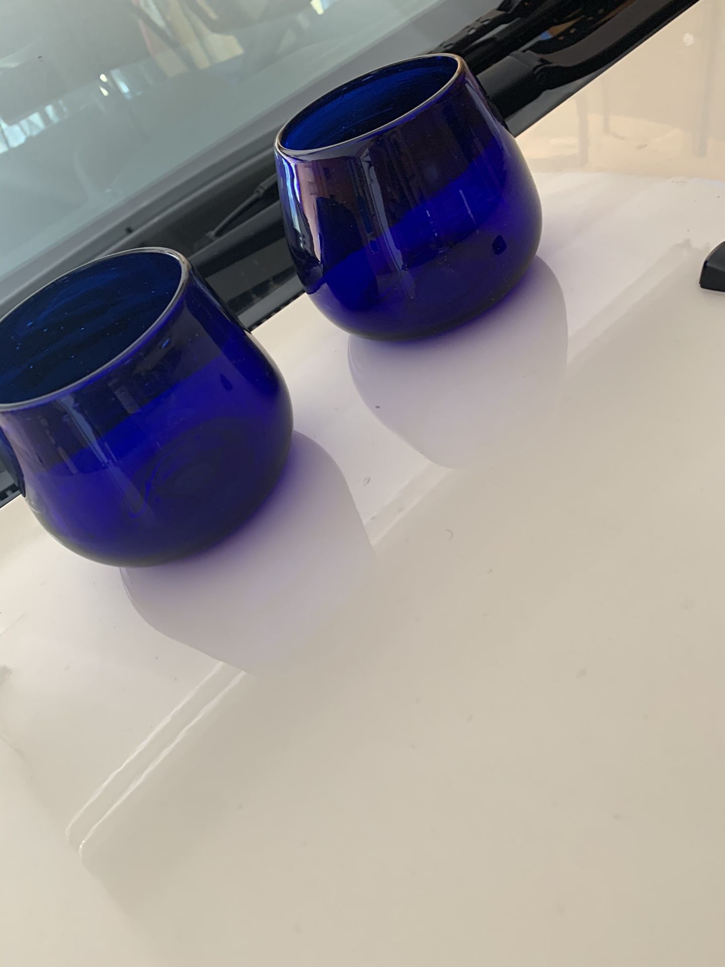 7 royal Blue glass candle holders