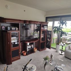 Burgundy Mahogany Wall Unit Two Glass Shelves Each Side Storage Put Away Pull Out Video Movie Storage Hole 75-in TV Screen Good Condition