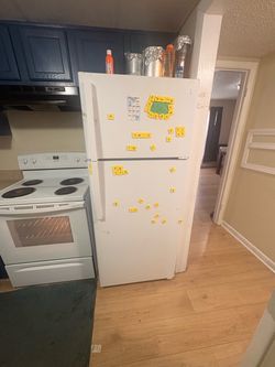 White Top-Freezer Refrigerator and Stove