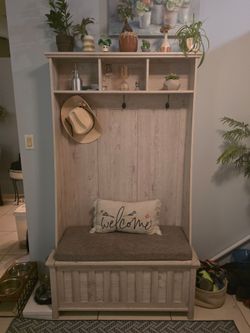 Entryway coat hanger bench with storage