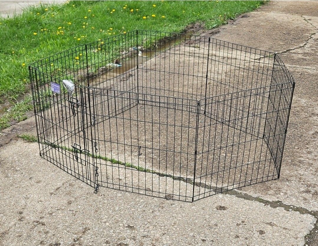Black E Coat exercise foldup metal pen
(pets or children)
24 W x 24 H" 61 W x 61 H cm. 8 panels. a door is included. Hardware is included.