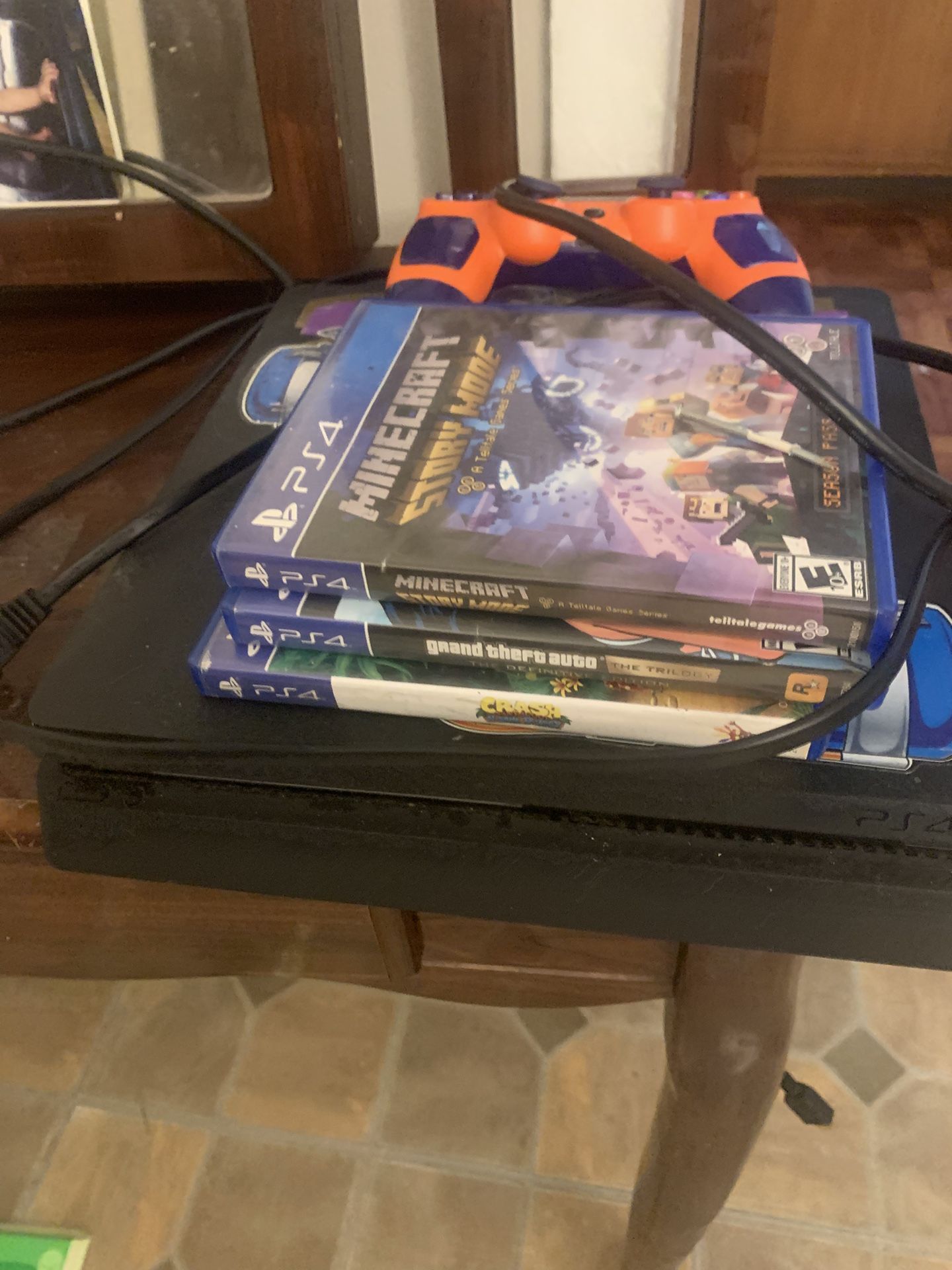 PS4 Game System and 4 Games