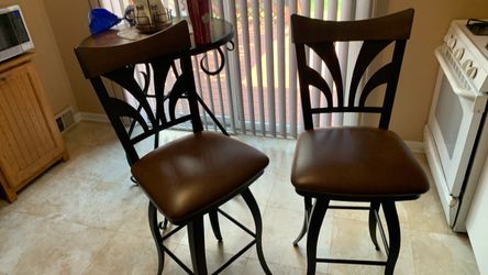 Two tall bar stools