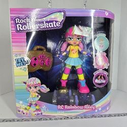 JAKKS Pacific Rock N Rollerskate Doll Rainbow Riley Light Up Remote Control Rollerskating Doll - Plays Music and Skates!, 10" H