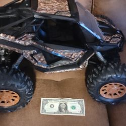 Previously Owned Plastic Polaris Quad Toy 
