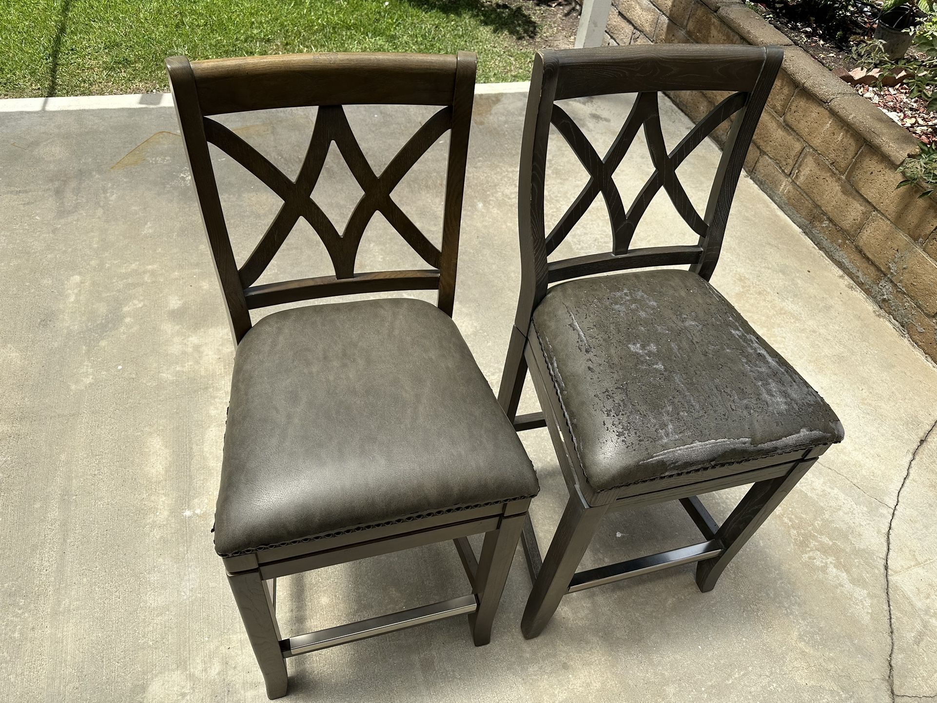 2 leather wooden bar stool chairs with foot rests