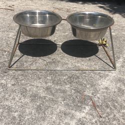 Silver dog bowls and stand
