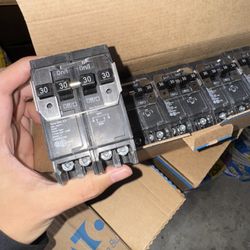 Breaker 30amp 2poles.  20amp 1pole