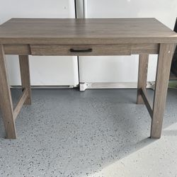 Washed gray console table with drawer